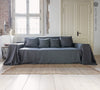 Renew your living space effortlessly with our charcoal grey linen couch cover. Its thoughtful design ensures complete coverage, extending gracefully over the arms. Discover the perfect balance of functionality and elegance with our collection today.