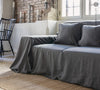 Renew your living space effortlessly with our charcoal grey linen couch cover. Its thoughtful design ensures complete coverage, extending gracefully over the arms. Discover the perfect balance of functionality and elegance with our collection today.