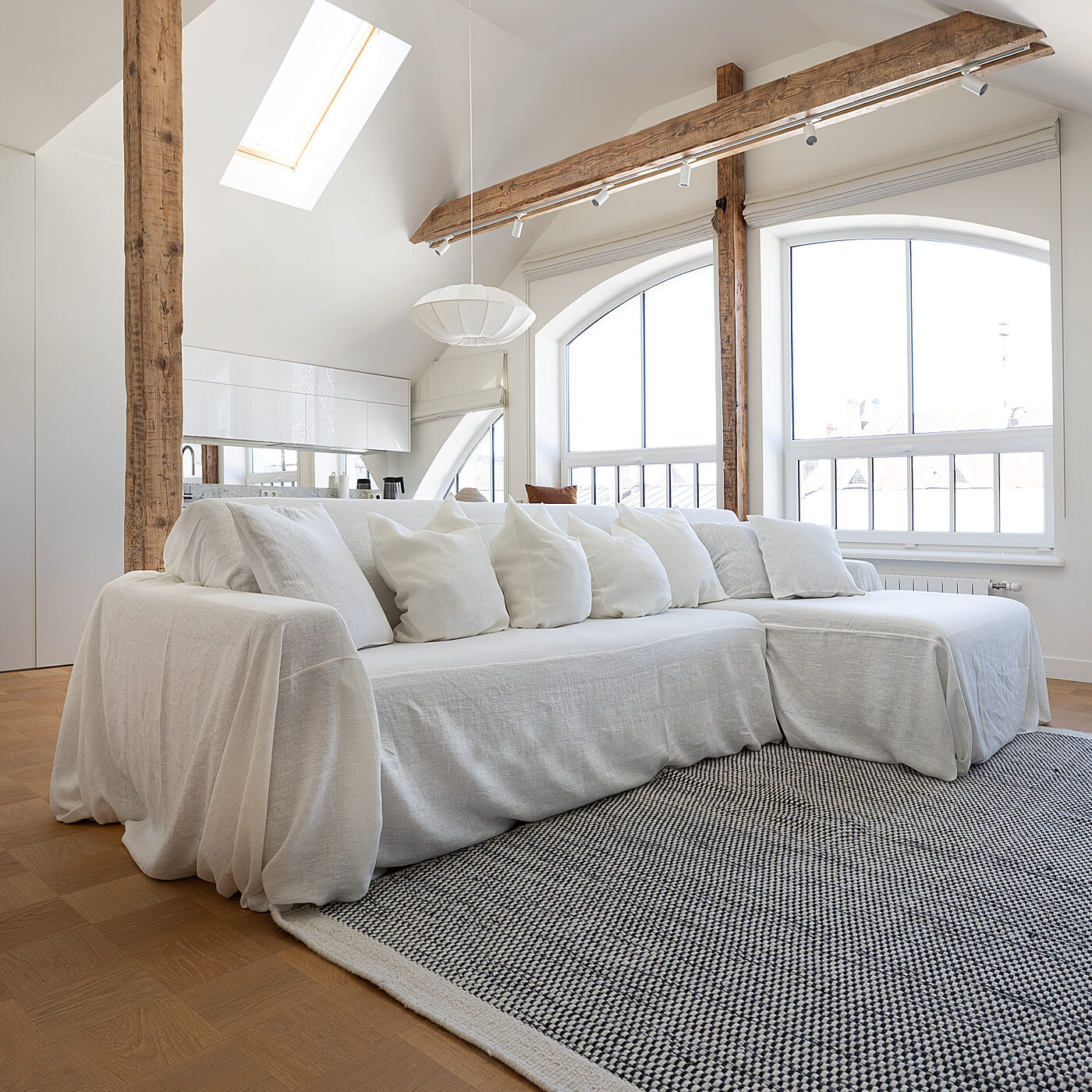 Corner sofa with chaise in a white linen sectional cover