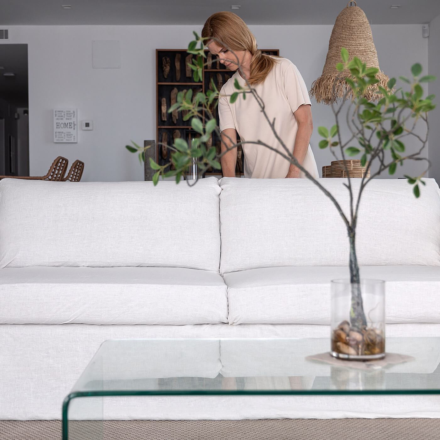 Finishing the linen cover at the back of the sofa