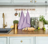 The light lilac tea towels made of natural linen are durable, making them the ideal companions for your daily culinary adventures.