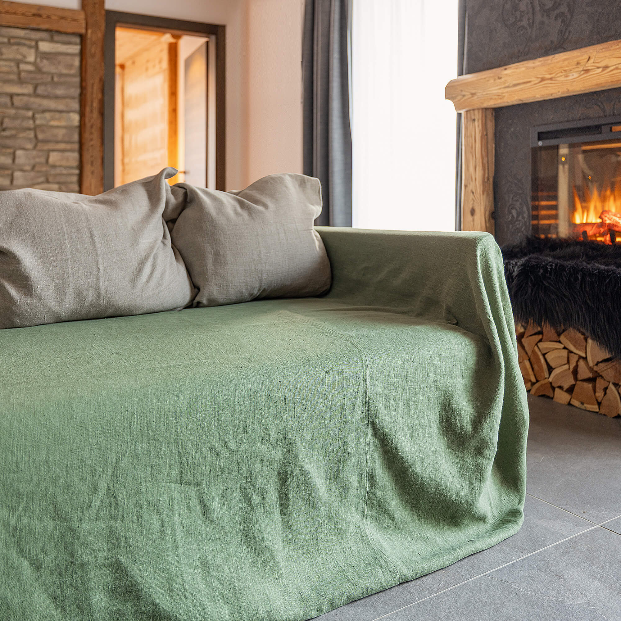 Upgrade your sofa with ease and elegance – transform your home today with our moss green linen couch cover. Linen cover serves as an ideal safeguard against the playful antics of your beloved pets, preserving your couch for years to come.