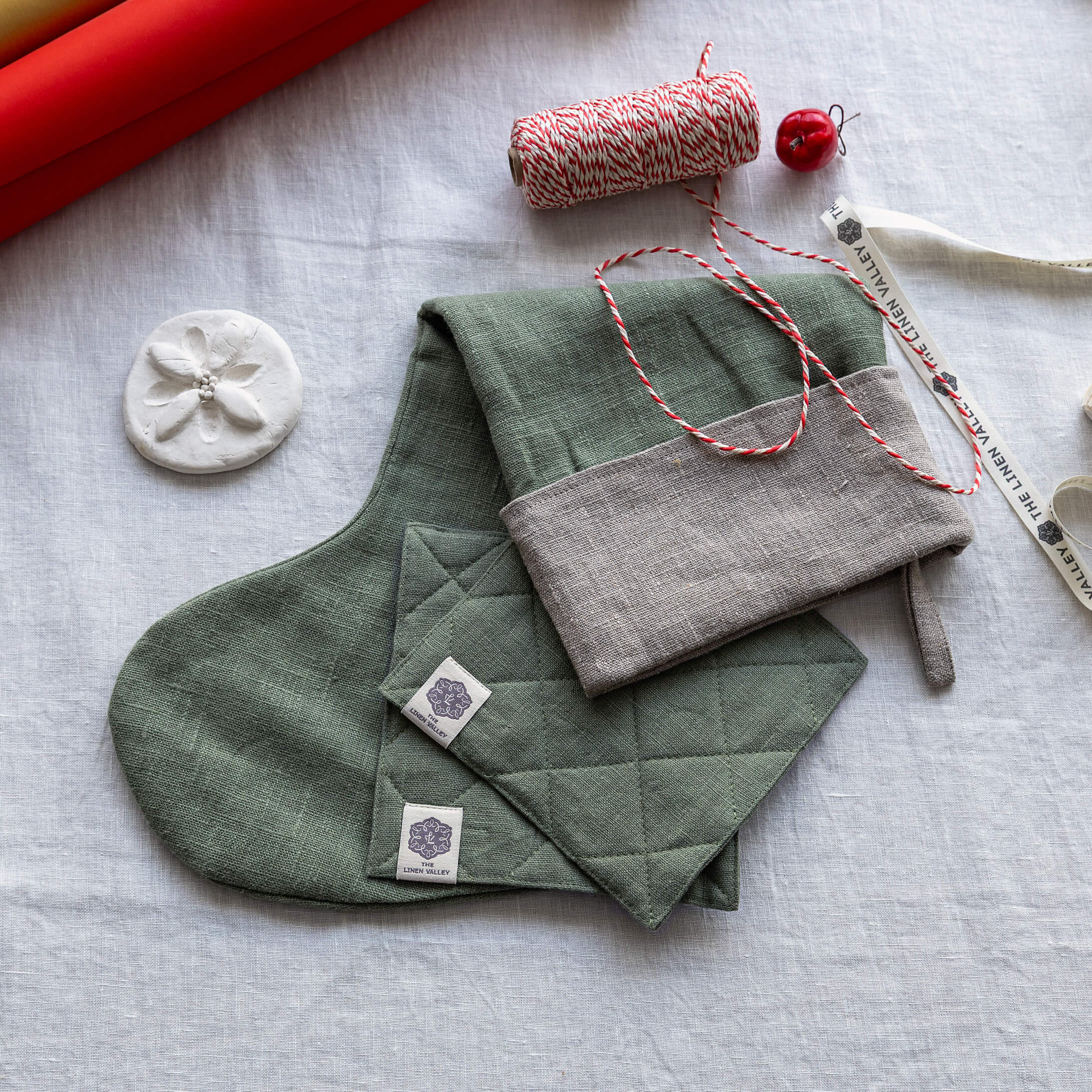 Moss green linen Christmas stocking and coasters gift set in heavyweight 260 g/m² European linen