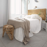 Rustic heavy linen waffle throw crafted from a cozy waffle weave, blanket adds a layer of warmth and style to any bedroom decor.