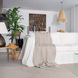 Rustic heavy linen waffle throw crafted from a cozy waffle weave, blanket adds a layer of warmth and style to any bedroom decor.