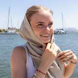 Natural linen scarf offers natural sun protection, breathability and a relaxed elegance that pairs effortlessly with any outfit.