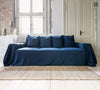 Navy blue linen couch cover designed and crafted to elevate your interior with a fresh look and great energy.
