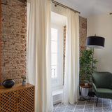 Lined off white linen curtain with lining, designed and made to provide maximum protection from the sun and heat coming through the window. Natural thermoregulatory properties of linen will help you to create comfortable atmosphere at home.