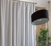 Blackout optical white linen curtains provide complete privacy and maximum protection from sunlight and artificial light sources.