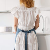 Explore our diverse range of styles, from classic neutrals to vibrant hues, and discover the apron that complements your personal taste and kitchen decor.