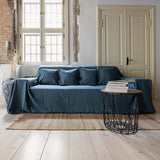Ocean blue linen couch cover designed and crafted to elevate your interior with a fresh look and great energy. It offers a practical solution for safeguarding your furniture against the playful antics of your beloved pets. 