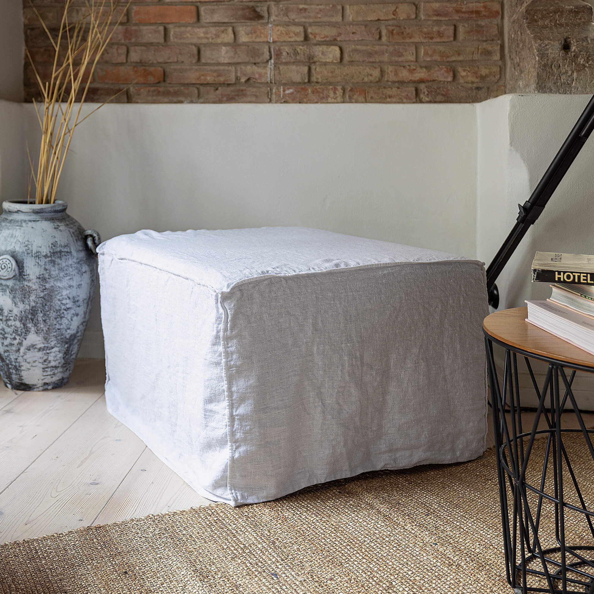 Introducing our new optical white linen ottoman cover – the ultimate solution for giving your ottoman a fresh look and upgrading your interior effortlessly.