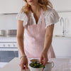 Explore our diverse range of styles, from classic neutrals to vibrant hues, and discover the apron that complements your personal taste and kitchen decor.