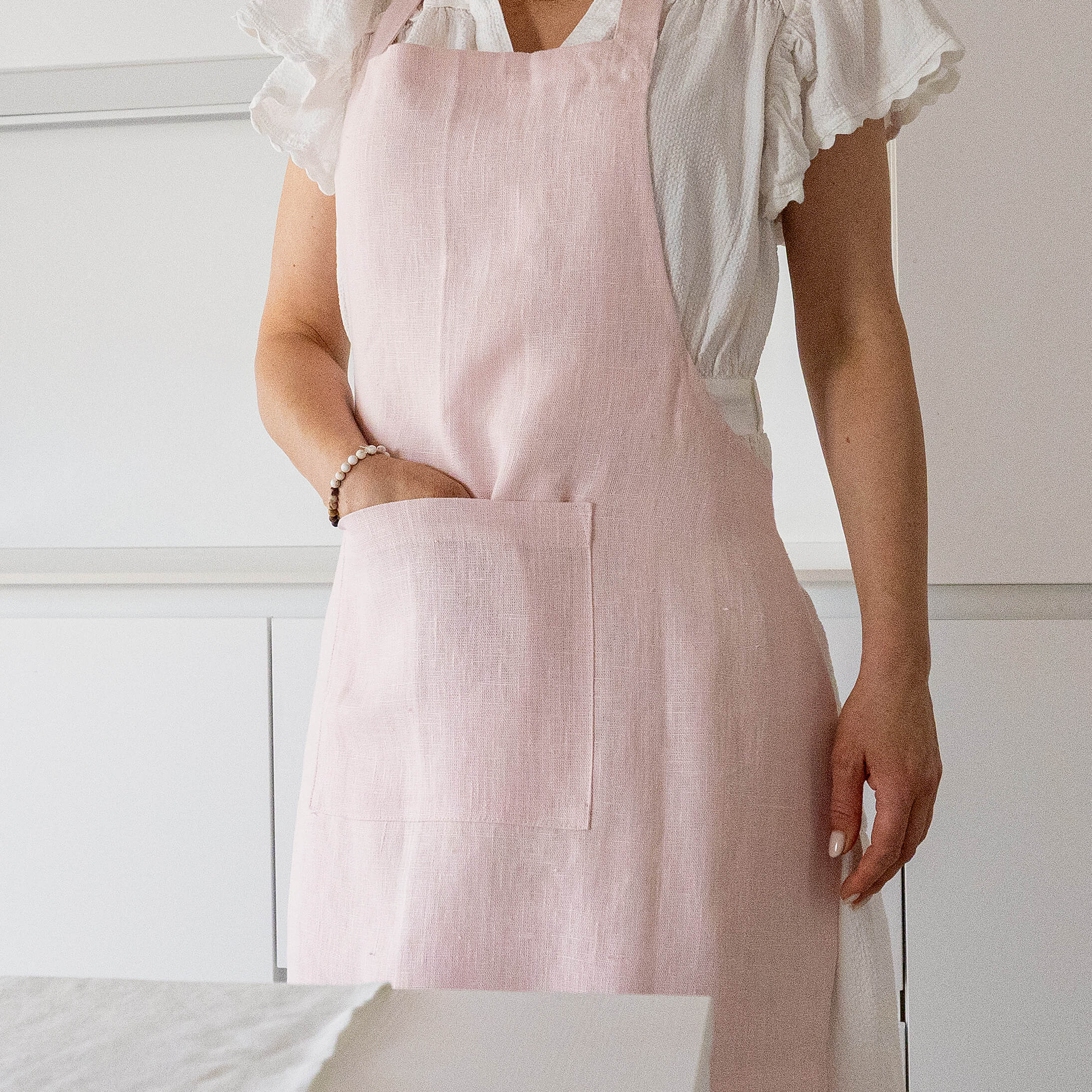 Explore our diverse range of styles, from classic neutrals to vibrant hues, and discover the apron that complements your personal taste and kitchen decor.