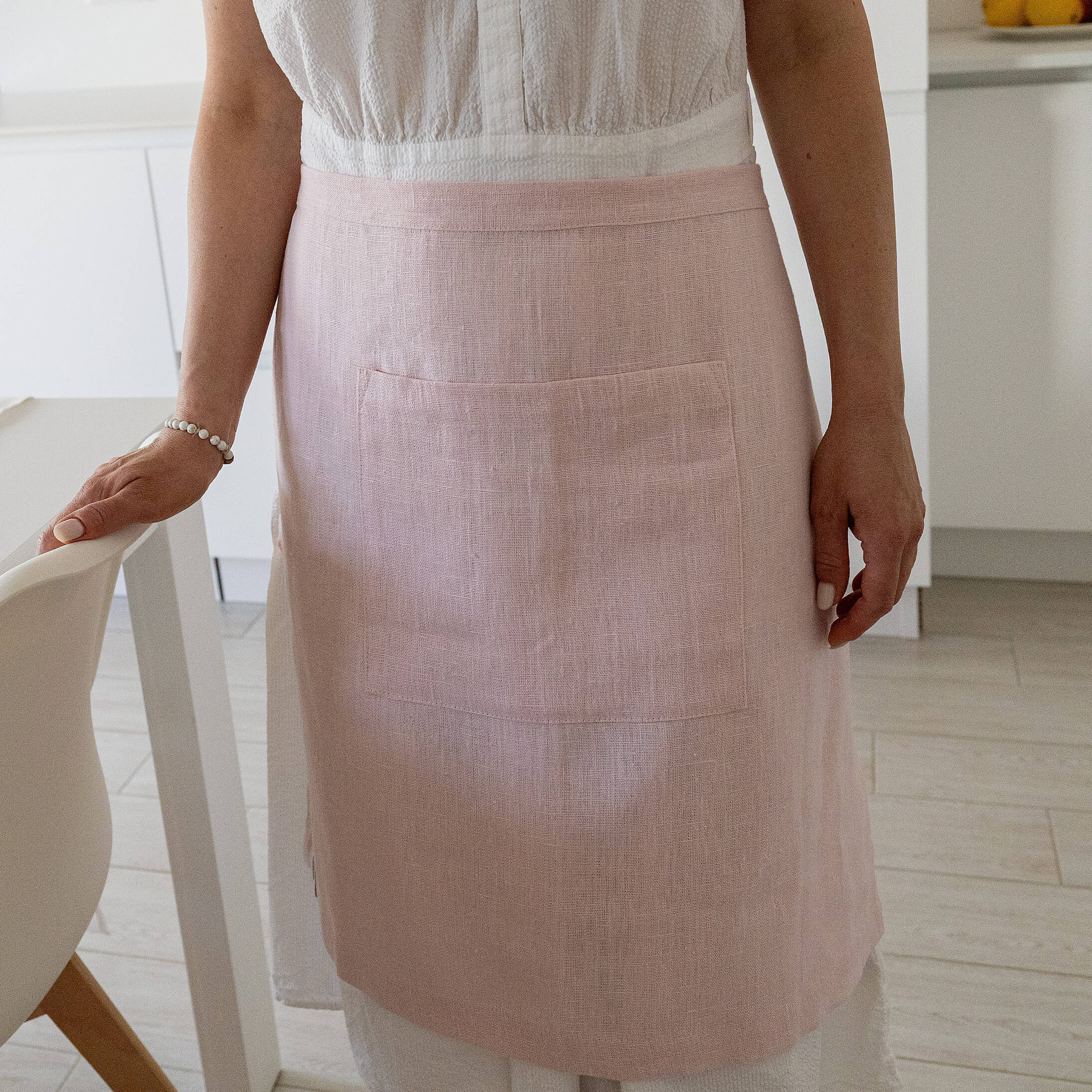 Explore our diverse range of styles, from classic neutrals to vibrant hues, and discover the apron that complements your personal taste and kitchen decor.