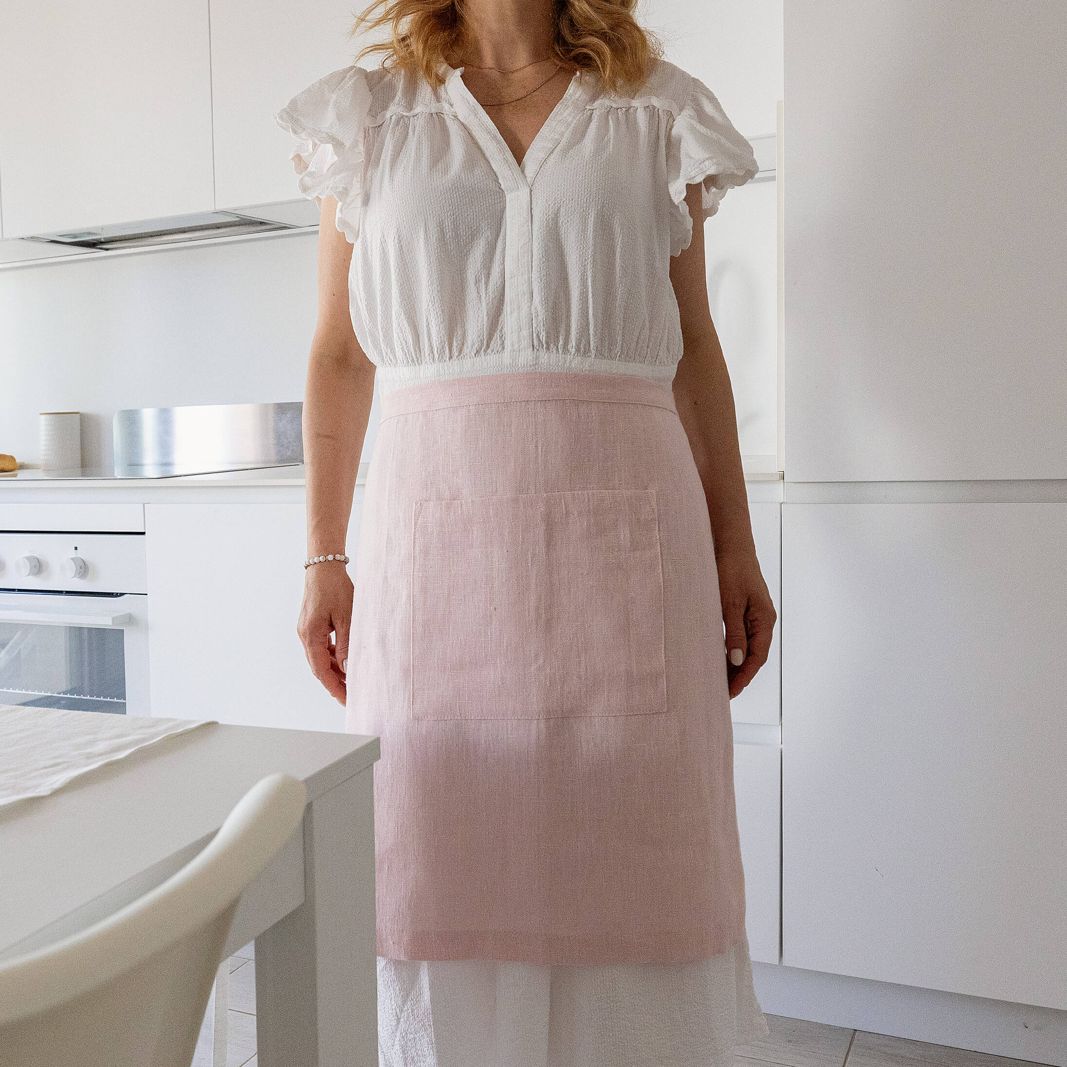 Explore our diverse range of styles, from classic neutrals to vibrant hues, and discover the apron that complements your personal taste and kitchen decor.