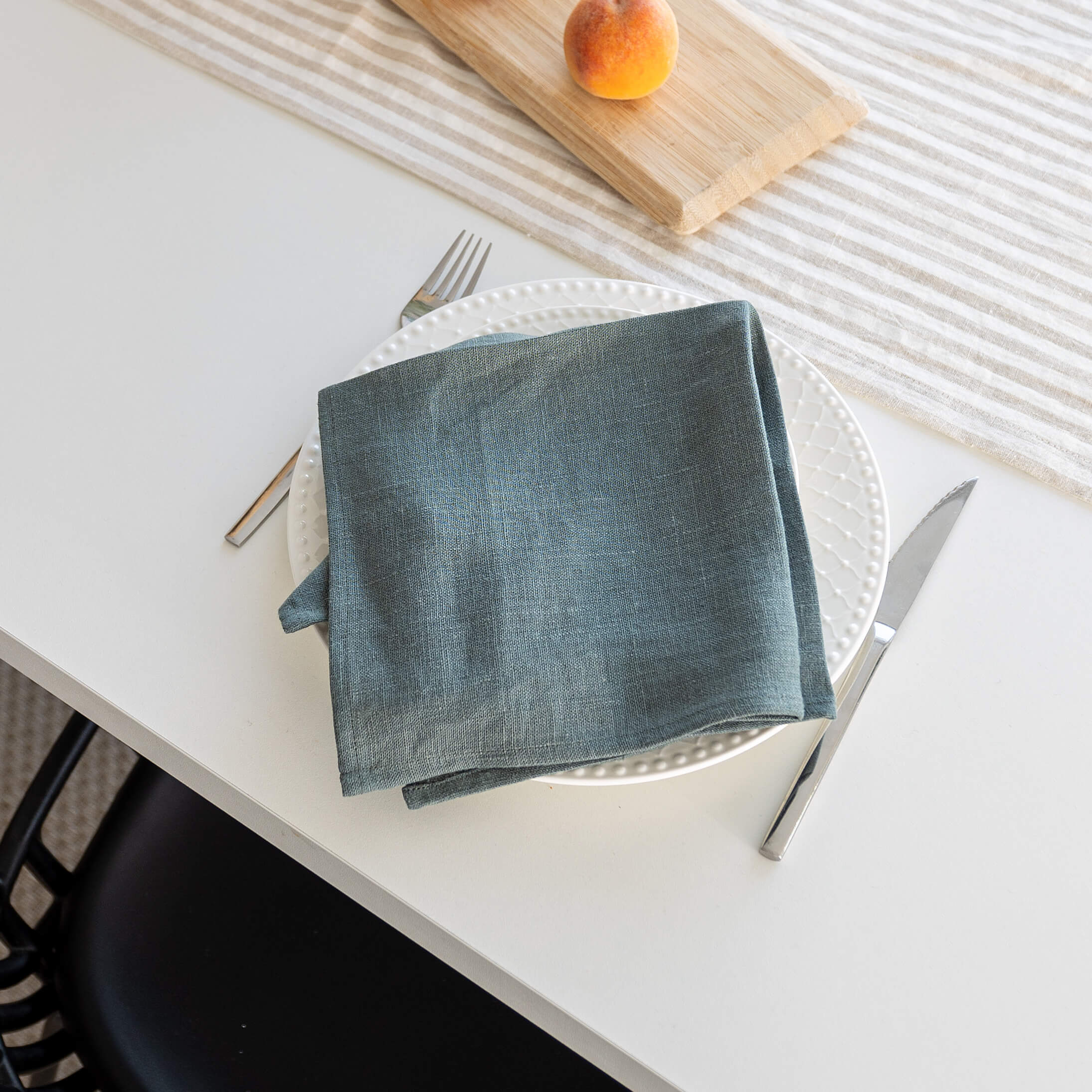 Introducing our teal blue linen napkins set, designed to elevate your dining experience with a touch of warmth and charm. Crafted with care, these napkins are the perfect companions for your culinary adventures.