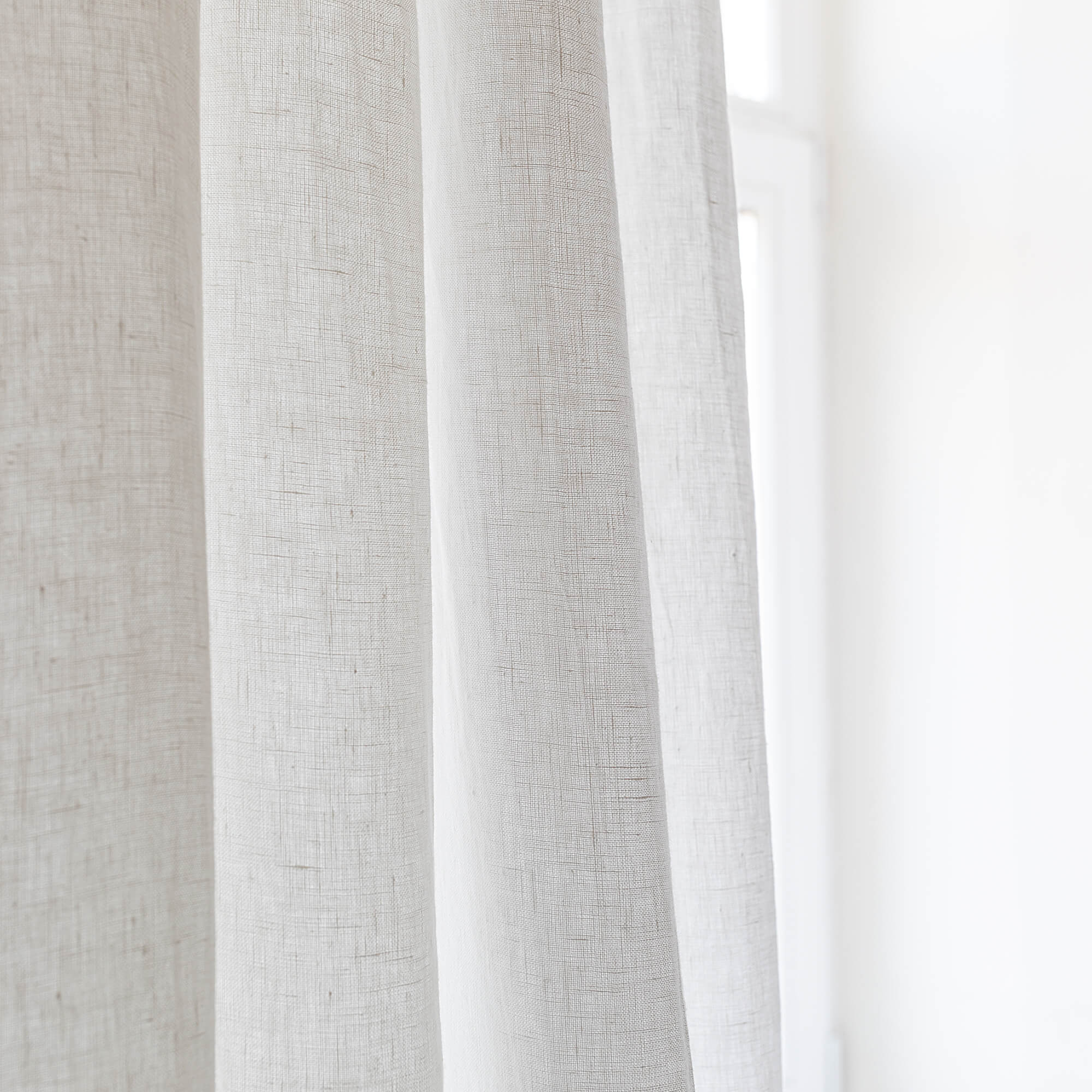Our optical white linen curtains with ruffles are designed and made to give your home unique and timeless charm. Linen curtains would complement interiors from minimalistic, Scandinavian or modern to Mediterranean or classical style.