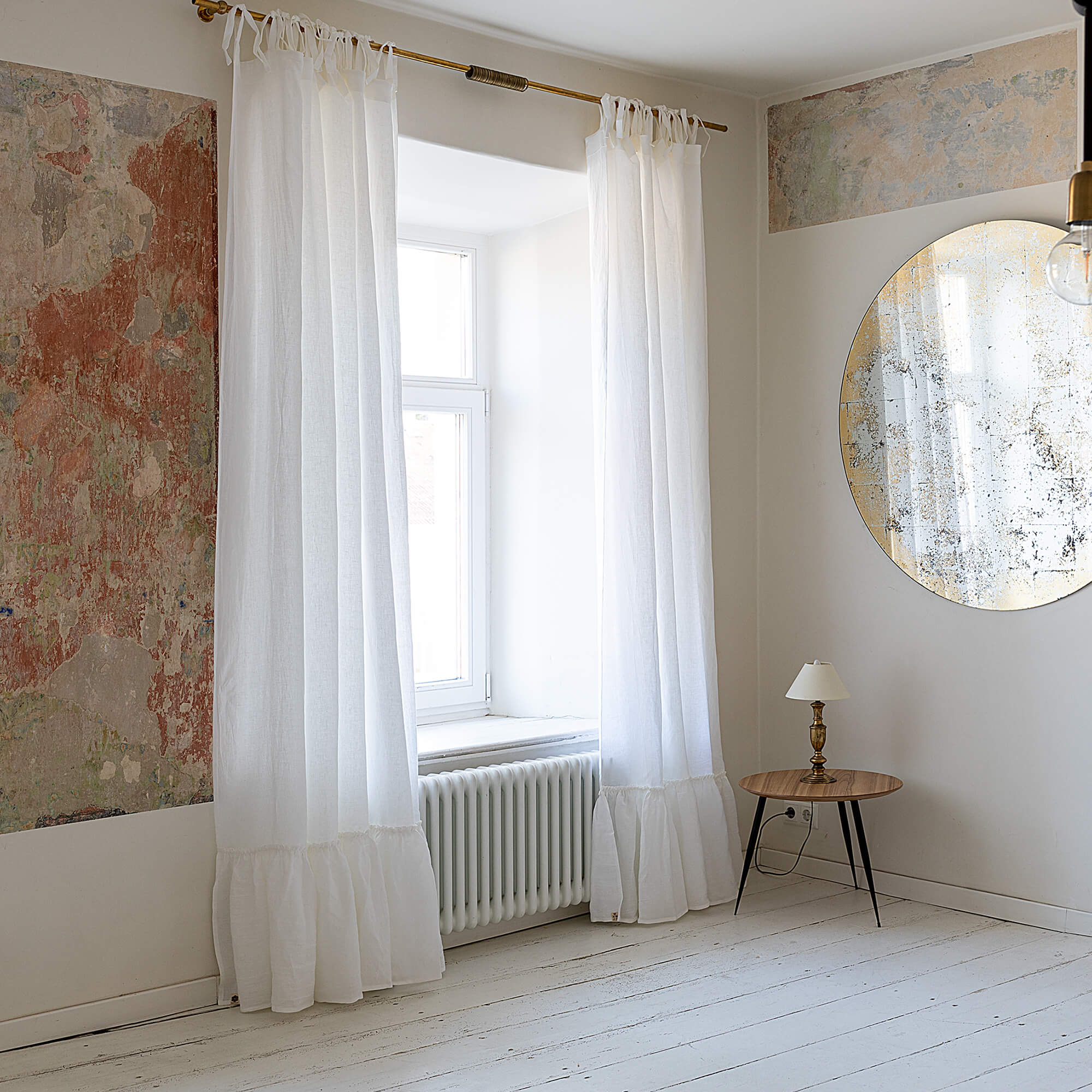 Our optical white linen curtains with ruffles are designed and made to give your home unique and timeless charm. Linen curtains would complement interiors from minimalistic, Scandinavian or modern to Mediterranean or classical style.