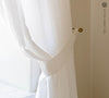 Our optical white linen curtain tie-back the perfect solution to keeping your curtains looking neat and stylish.