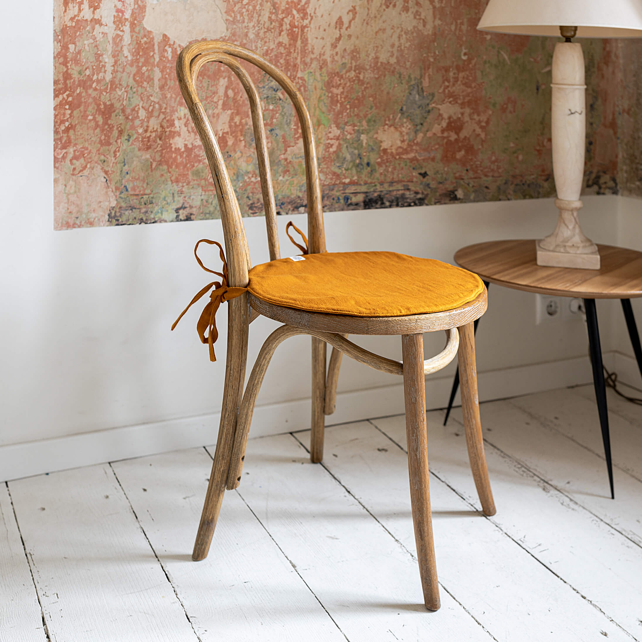 Our amber yellow linen chair slipcovers offer both practicality and aesthetic appeal. The covers will protect dining chairs from spills and stains, also enhance the visual appeal of your space with their timeless natural style. Slipcovers will simply change your chairs' appearance and provide an elegant solution.