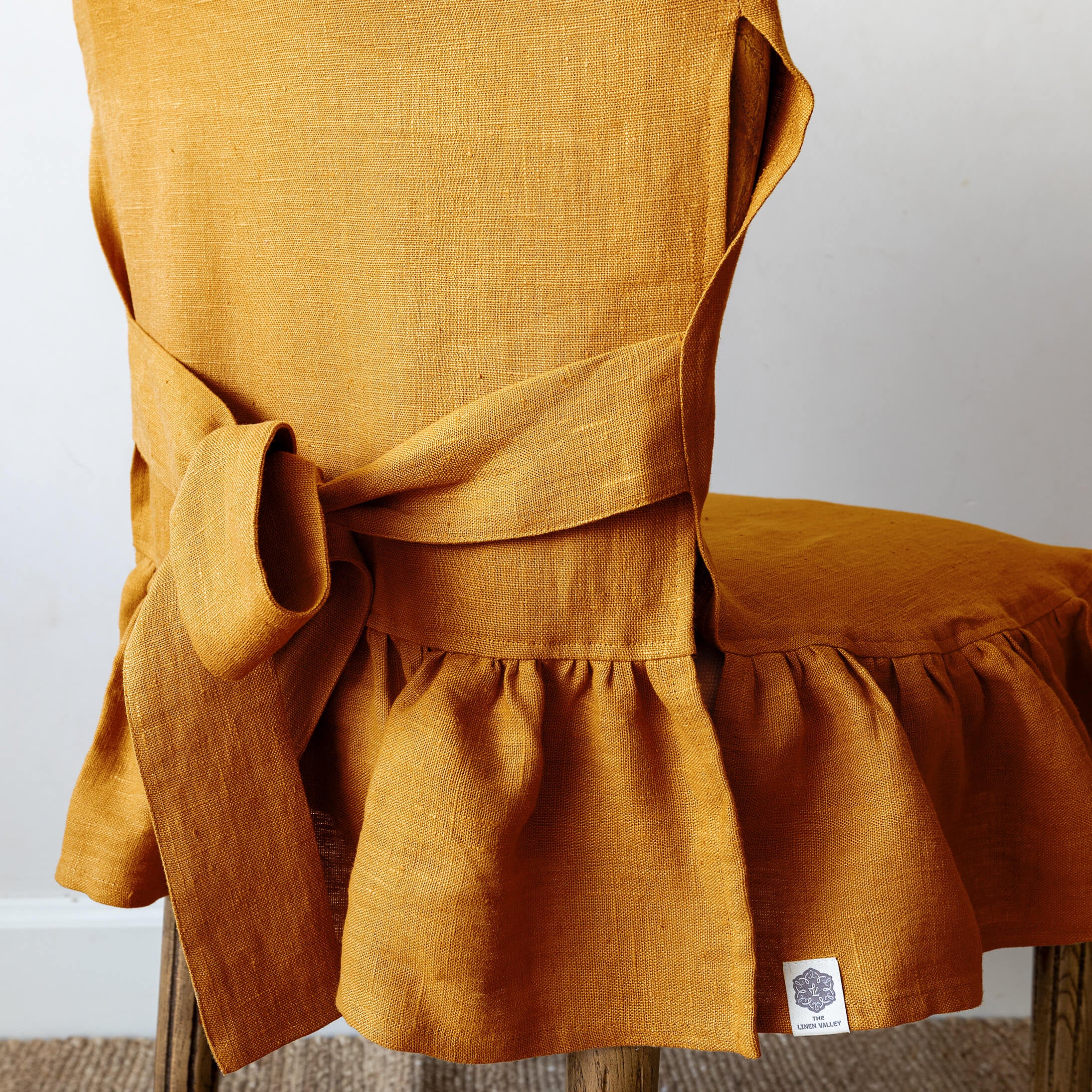 Amber yellow linen ruffled full chair cover in heavyweight 260 g/m² European linen