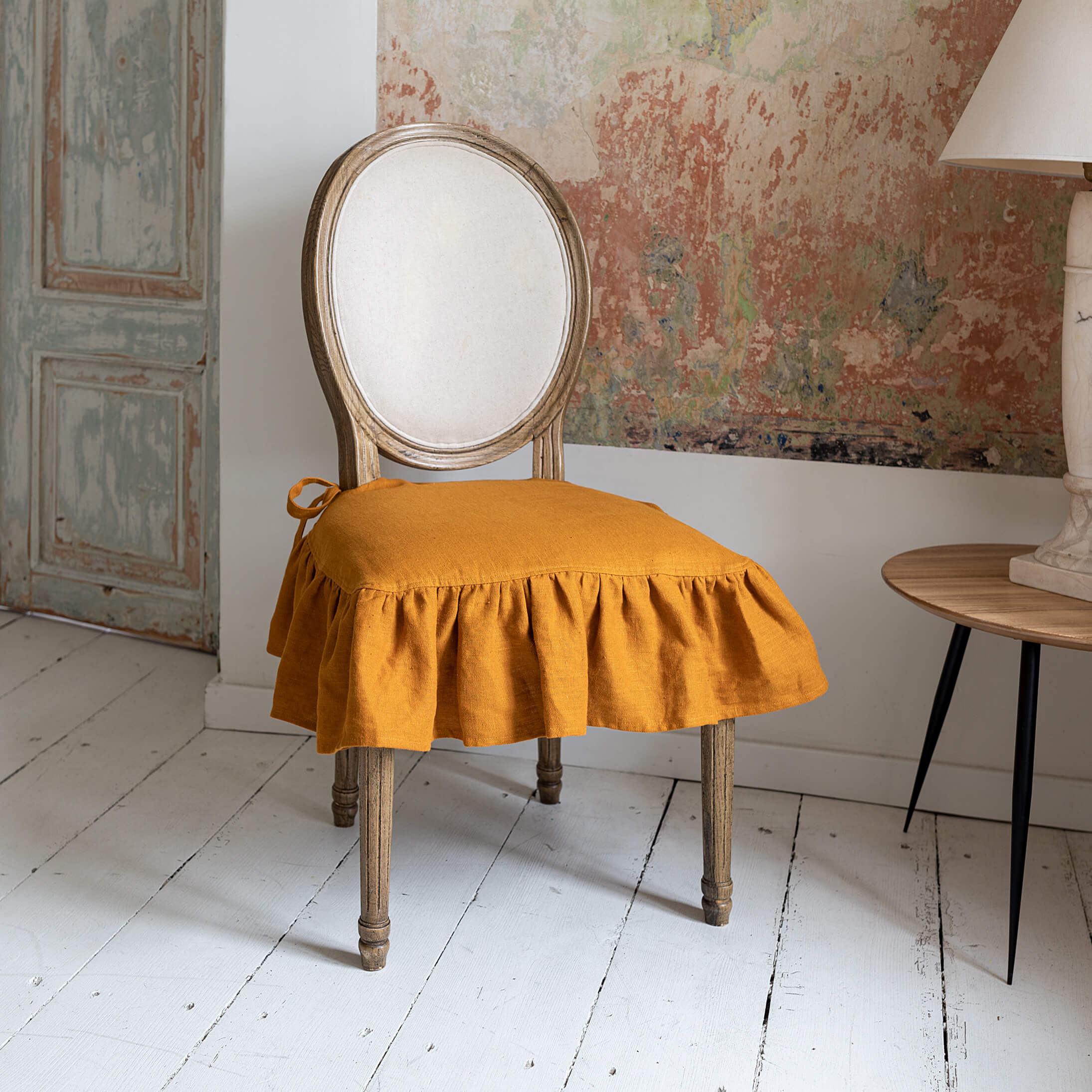 Our amber yellow linen slipcovers offer both practicality and aesthetic appeal. The covers will protect dining chairs from spills and stains, also enhance the visual appeal of your space with their timeless natural style. Slipcovers will simply change your chairs' appearance and provide an elegant solution.