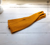 Our amber yellow linen curtain tie-back the perfect solution to keeping your curtains looking neat and stylish.
