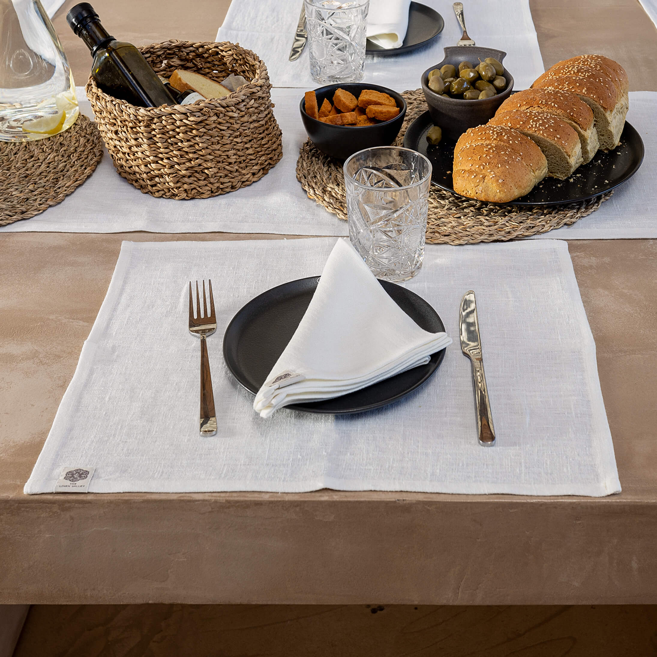 Discover The Linen Valley's antique white linen placemats, which combines everyday luxury with sustainable elegance, where natural linen completely transforms and enhances your table setting.