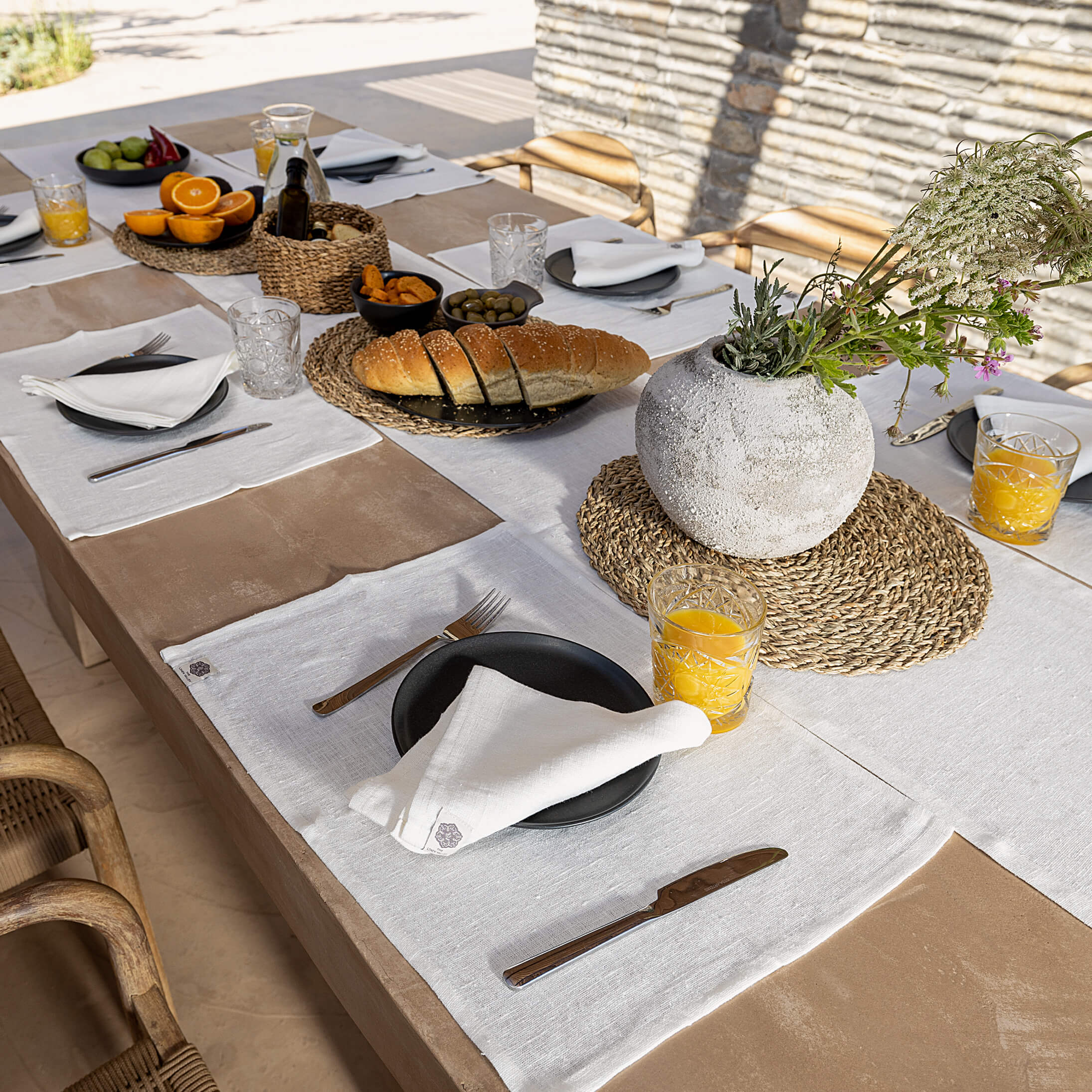 Discover The Linen Valley's antique white linen placemats, which combines everyday luxury with sustainable elegance, where natural linen completely transforms and enhances your table setting.