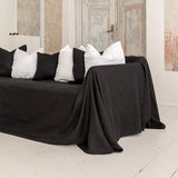 Choosing black colour for your sofa not only offers protection but also brings a timeless elegance, natural linen covers can enhance the aesthetic of your living space while ensuring long-lasting protection for your furniture.