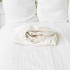 Our optical white linen fitted sheet, designed to elevate the comfort and style of your classical bedroom.Crafted from premium linen, these sheets offer a gentle touch and exceptional breathability, ensuring a luxurious sleeping experience every night.
