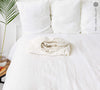 Our optical white linen fitted sheet, designed to elevate the comfort and style of your classical bedroom.