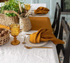 Introducing our amber yellow linen napkins set, designed to elevate your dining experience with a touch of warmth and charm.