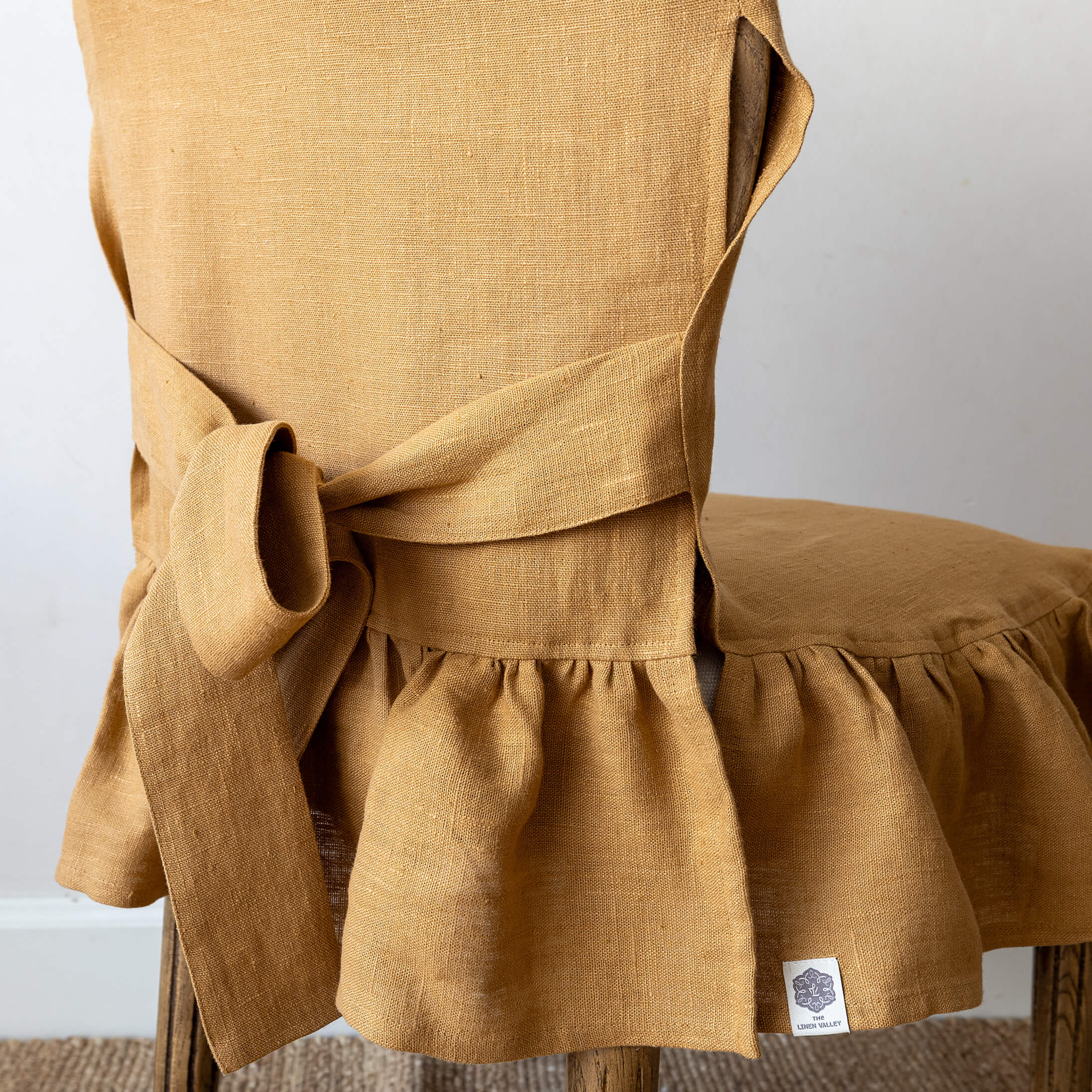 Dusty mustard linen ruffled full chair cover in heavyweight 260 g/m² European linen