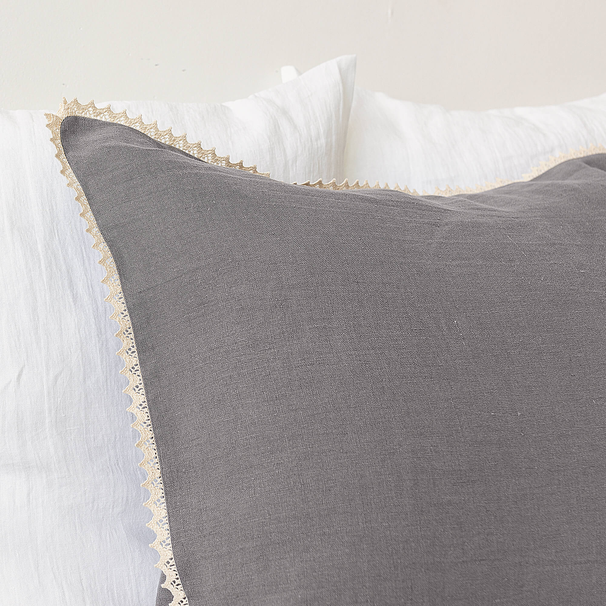 Our charcoal grey linen pillowcases will add a touch of elegance and style to your bedroom.