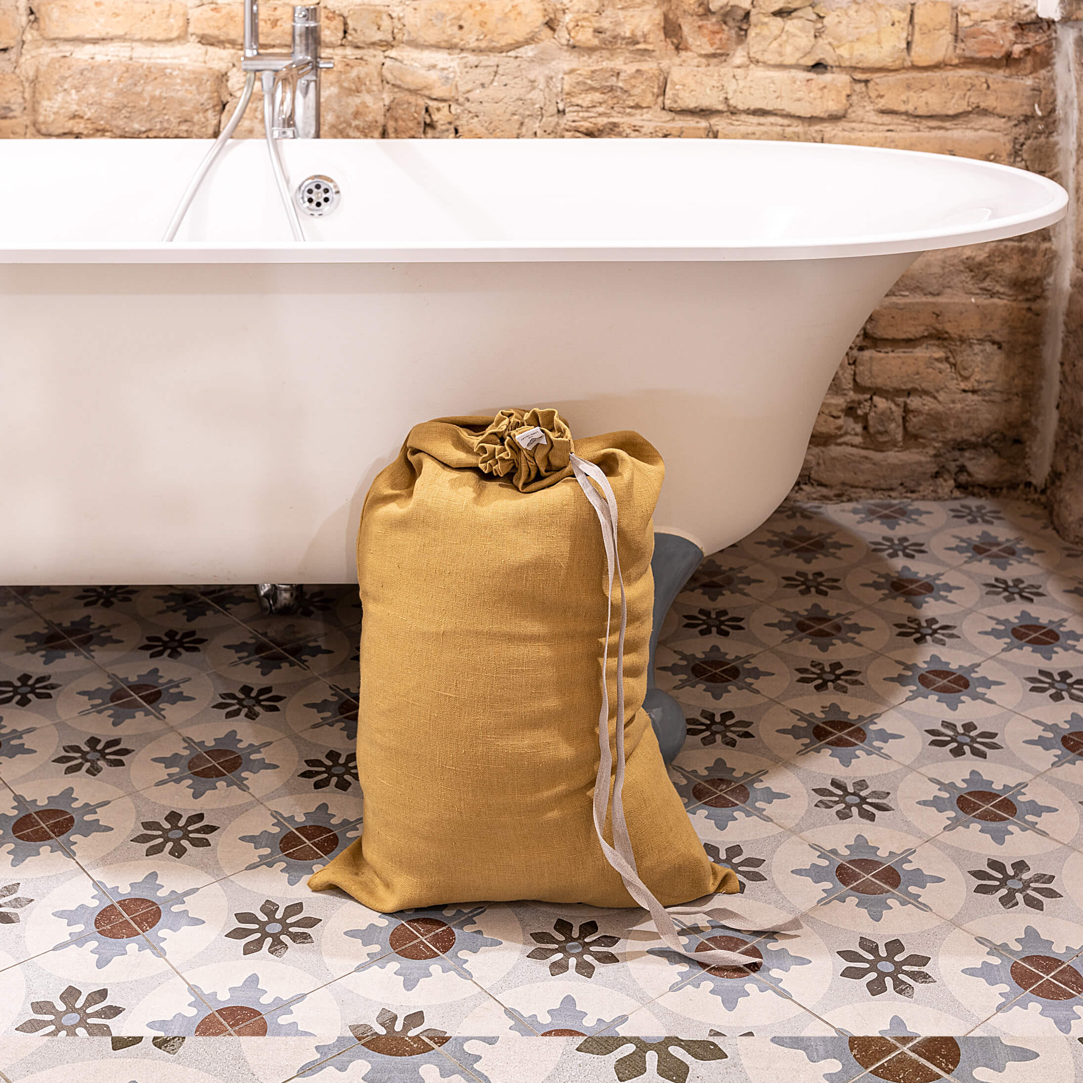 Introducing our dusty mustard linen laundry bag, the ultimate solution for keeping your laundry organised in style.