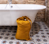 Introducing our amber yellow linen laundry bag, the ultimate solution for keeping your laundry organised in style.