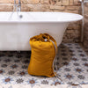 Introducing our amber yellow linen laundry bag, the ultimate solution for keeping your laundry organised in style.