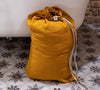 Introducing our amber yellow linen laundry bag, the ultimate solution for keeping your laundry organised in style.