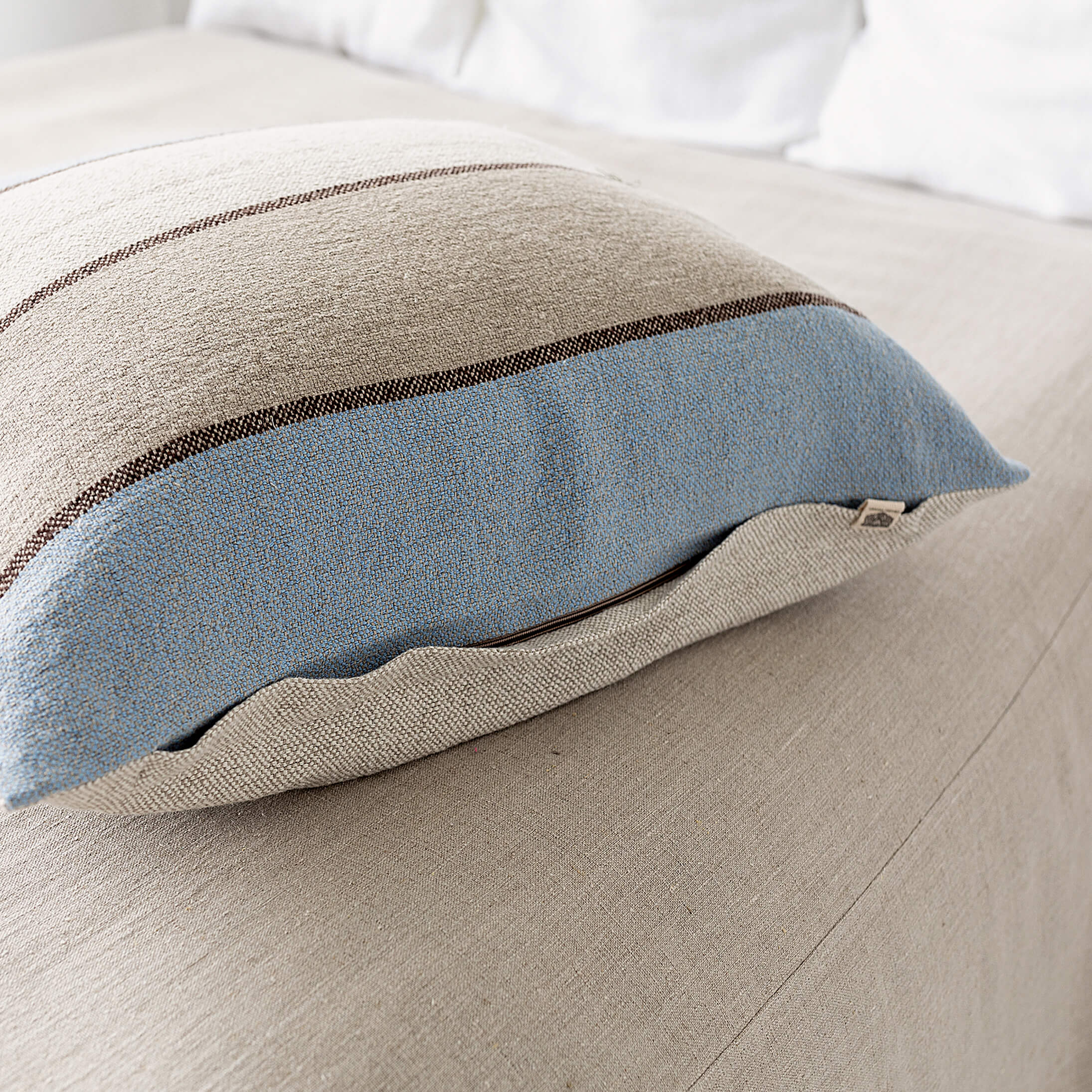 Sometimes it takes just a small detail to make a home interior complete, perfect and unique. And that little detail could be our multicoloured striped linen pillow sham with zipper.