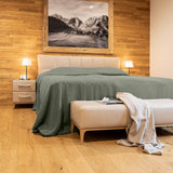 The moss green linen bedspread has been carefully designed to suit a wide range of interior styles and to blend perfectly in both classic and contemporary home spaces. Linen bedspreads are extremely versatile, fitting into a wide range of interiors.