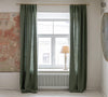 Lined moss green linen curtains with lining, designed and made to provide maximum protection from the sun and heat coming through the window.