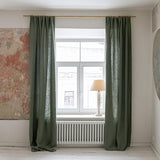 Lined moss green linen curtains with lining, designed and made to provide maximum protection from the sun and heat coming through the window. The natural thermoregulatory properties of linen will help you to create the most comfortable atmosphere.