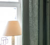 Lined moss green linen curtains with lining, designed and made to provide maximum protection from the sun and heat coming through the window. The natural thermoregulatory properties of linen will help you to create the most comfortable atmosphere.