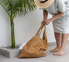 Dusty mustard linen bags designed and made for long, comfortable and sustainable use.