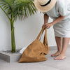 Dusty mustard linen bags designed and made for long, comfortable and sustainable use. Whether you're going to the beach, planning a visit to the organic market, or taking your baked cake to friends, our linen bag is always perfect for you.