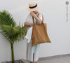 Dusty mustard linen bags designed and made for long, comfortable and sustainable use.