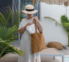 Dusty mustard linen bags designed and made for long, comfortable and sustainable use. Whether you're going to the beach, planning a visit to the organic market, or taking your baked cake to friends, our linen bag is always perfect for you.