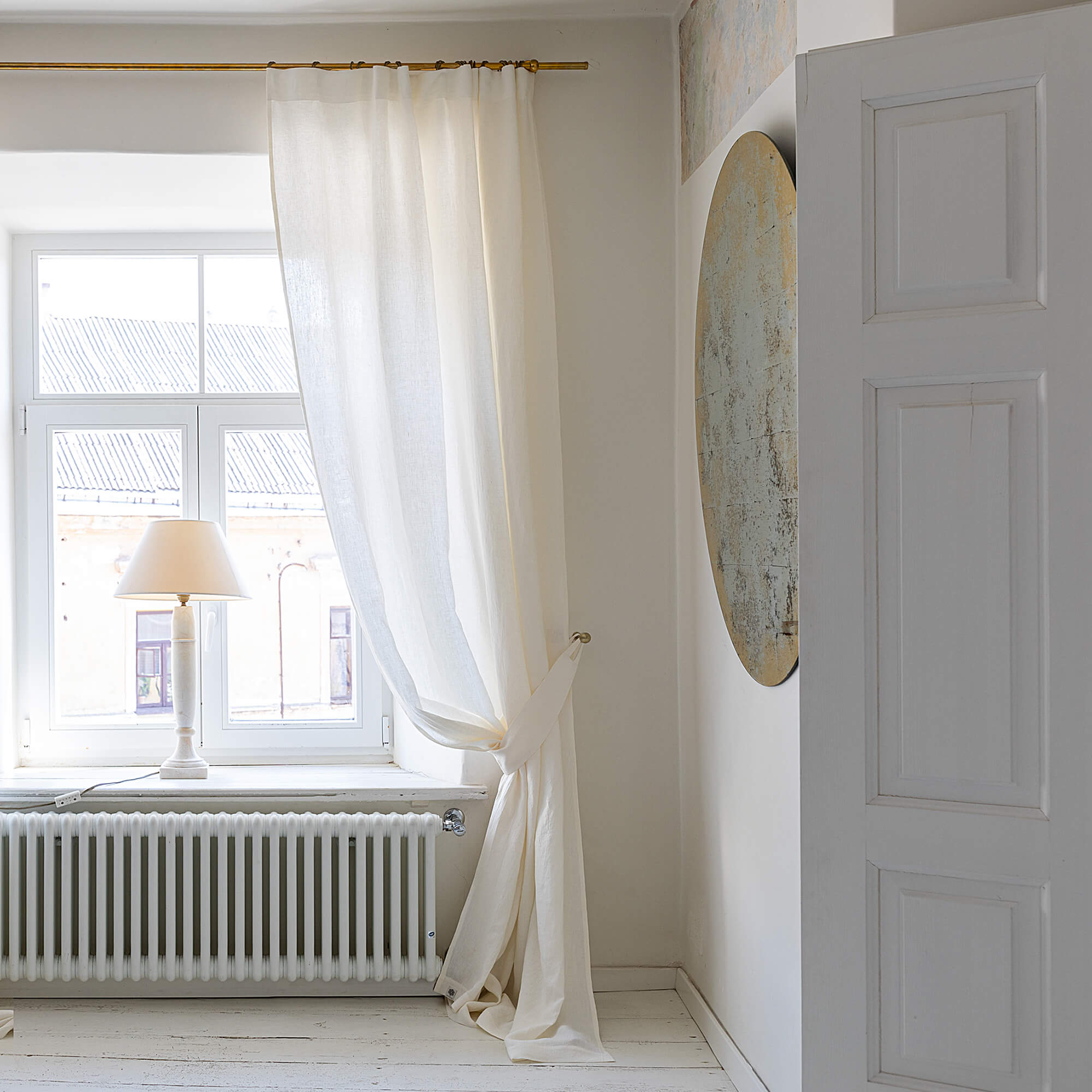 Our off white linen curtain tie-back is the perfect solution for keeping your curtains looking neat and stylish. Made from the highest-quality European linen, they offer durability and a luxurious feel.